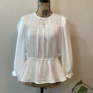 Prologue Ivory Peplum Top